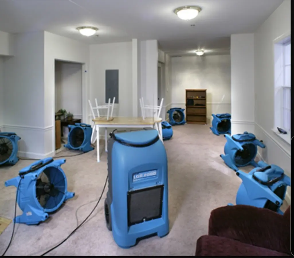Air movers and dehumidifier setup for Water Damage Restoration in Richmond
